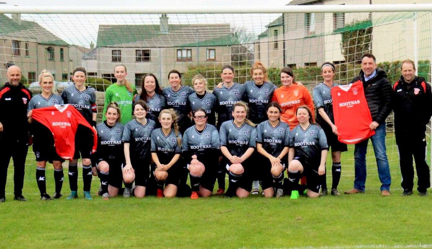 Caithness Ladies Football Club have been presented with a new kit, sponsored by Scott Youngson of Hootnas / the Comm. Manager Alana Mackay is pictured receiving the strip from Scott at the Castletown park which is Caithness Ladies' new home.