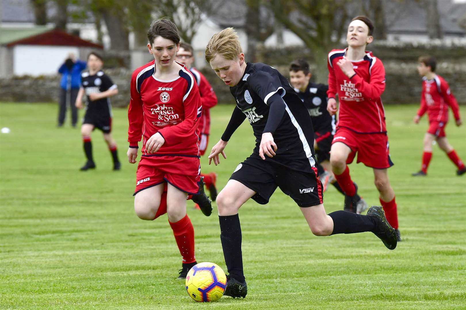 Toby Sutherland drives forward for Caithness United under-13s. Picture: Mel Roger