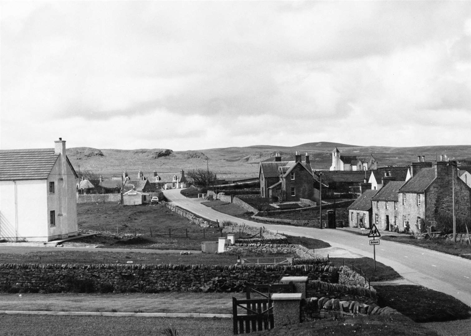 A classic Caithness rural scene, looking west from Reay with the historic parish church in the middle distance on the right. Jack Selby Collection / Thurso Heritage Society