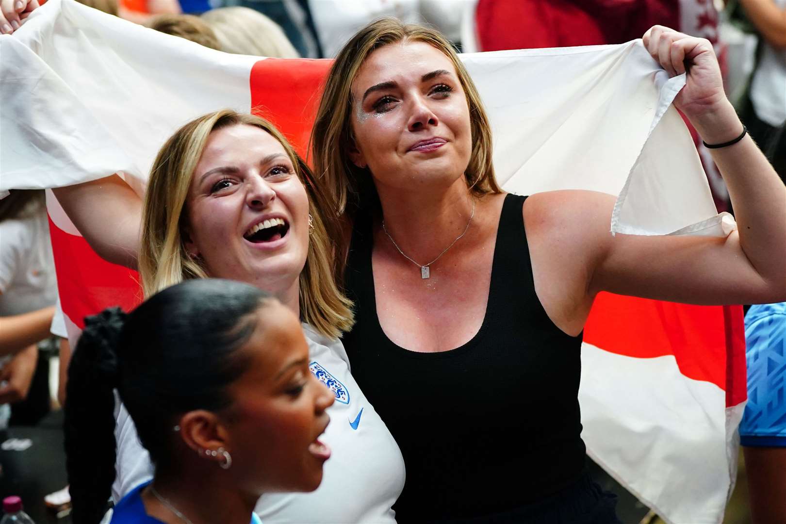 England fans celebrate following the match (Victoria Jones/PA)