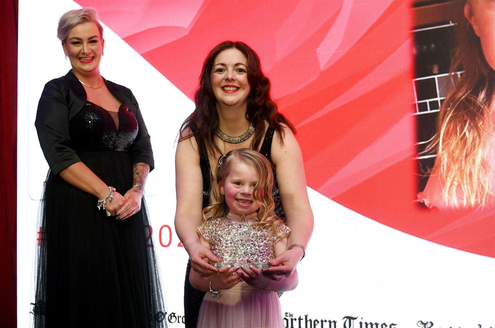 Gracie Andrew won the Brave Child award presented by Katrina Ashbolt of Macleod & MacCallum. Proud mum Katie is also pictured. Picture: James Mackenzie.