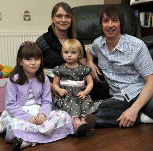 Pictured is Bethan with mum Jackie, dad John and sister Lauryn (6).