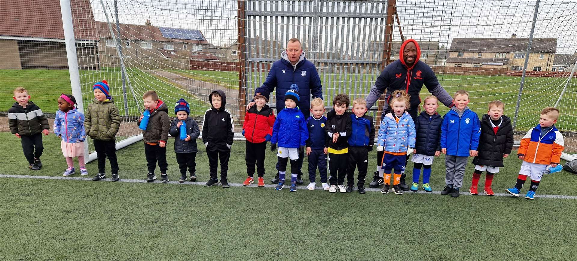 Stephen Wright and Marvin Andrews with children in the 3-5 age group at the Thurso Football Academy event.