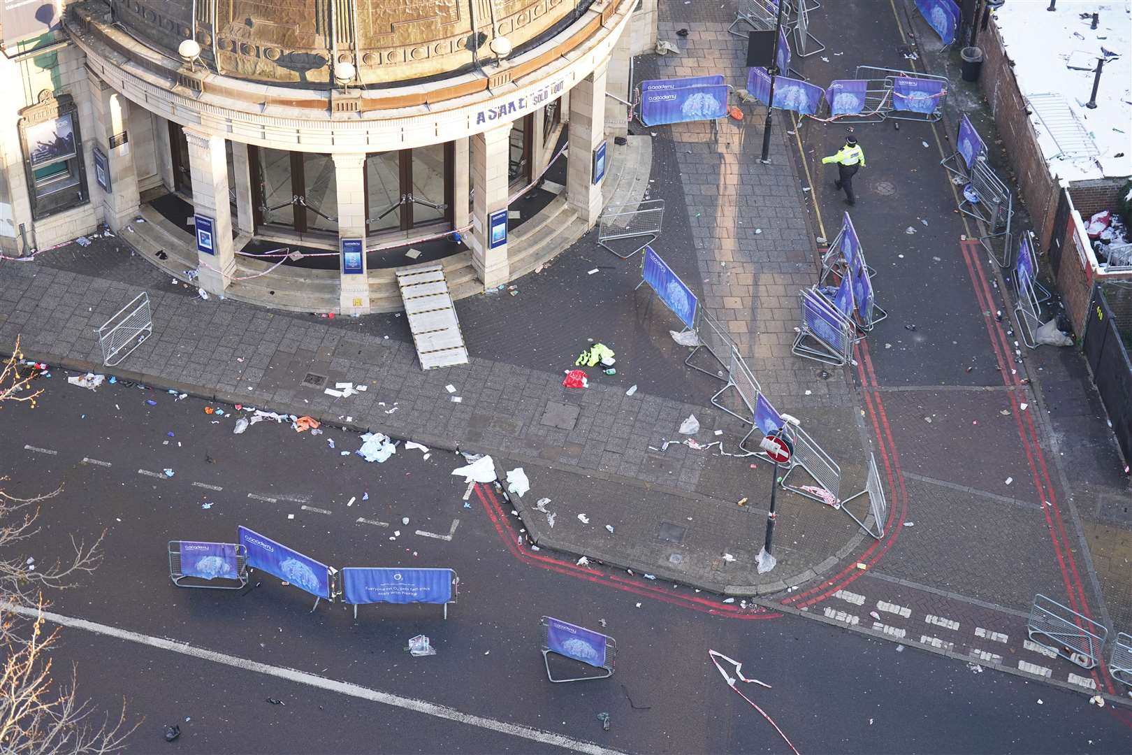 The scene outside the O2 Academy Brixton after four people suffered critical injuries in an apparent crush as a large crowd tried to force their way in (James Manning/PA)