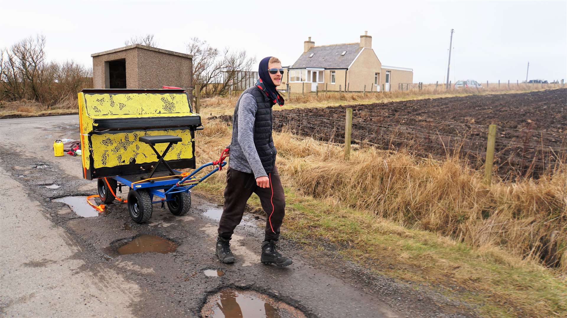 James came a cropper when his piano fell over after he hit a pothole just outside John O'Groats. Pictures: DGS