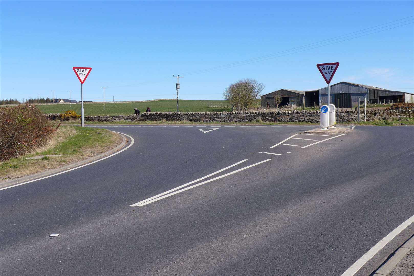 The controversial junction on the A9 where five vehicles have careered across the A882 crashing into the stone wall which surrounds farmer Christopher Coghill's field. Picture: Willie Mackay