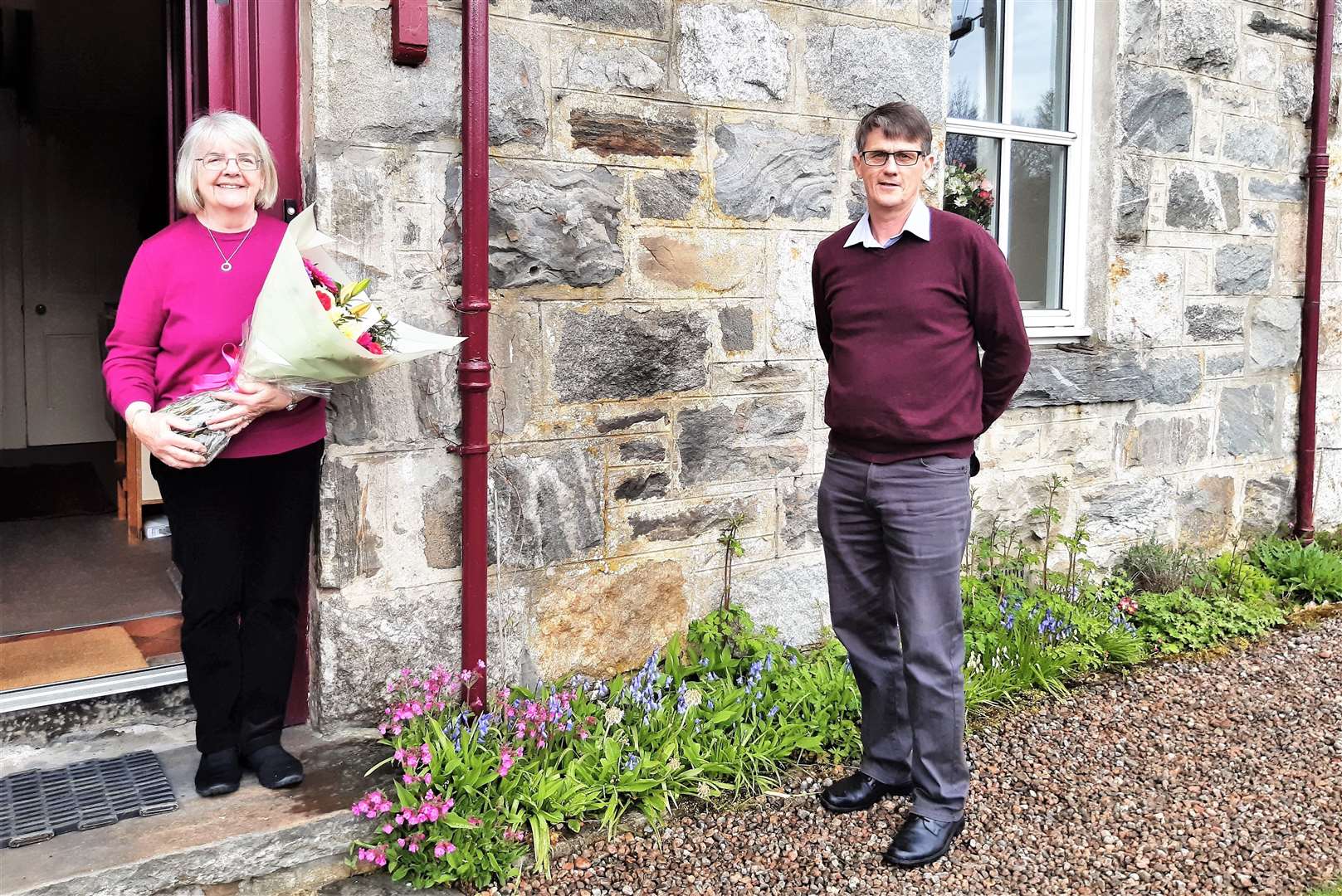 David Duff, Post Office network provision lead, presented gifts to Morag Macleod on her retiral.