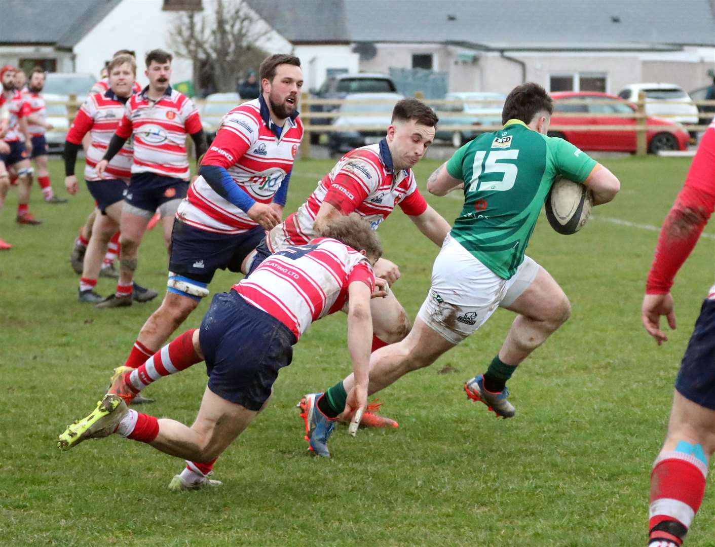 Cameron Ryder evades two tackles to break free and score a late try for Caithness. Picture: James Gunn