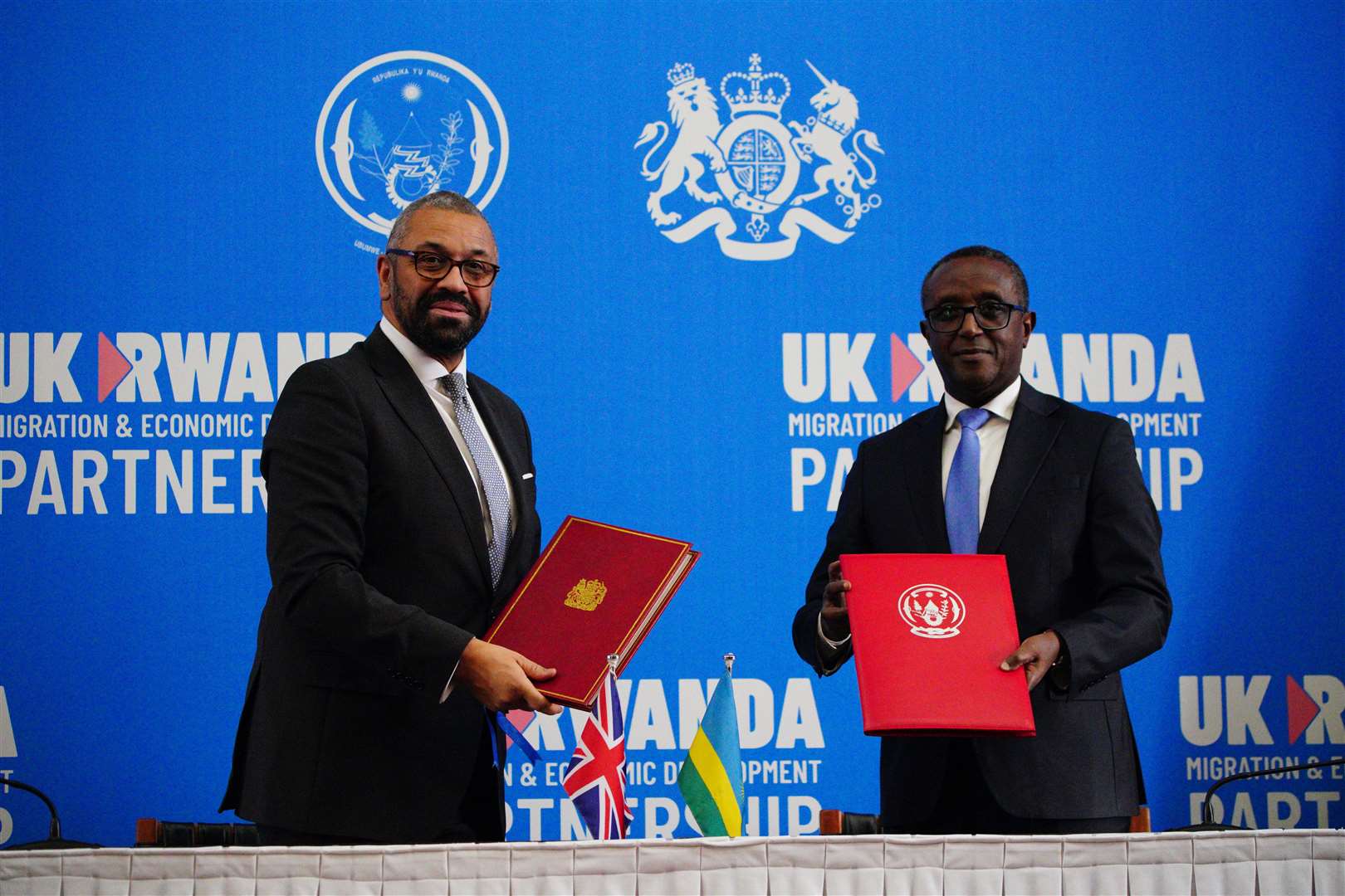 Home Secretary James Cleverly and Rwandan minister of foreign affairs Vincent Biruta signed the new treaty in Kigali on Tuesday (Ben Birchall/PA)