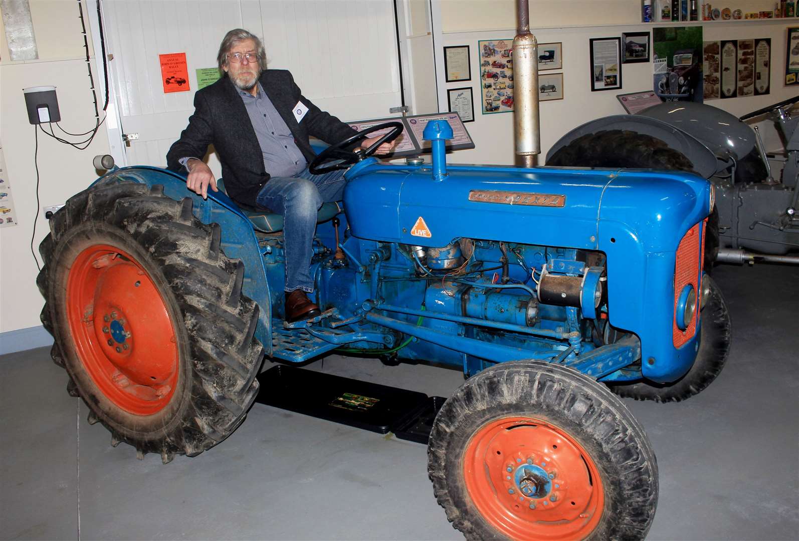 Chairman Chris Eyre sitting on a Fordson Dexta tractor. This year’s exhibition is entitled Life on the Land. Picture: Alan Hendry