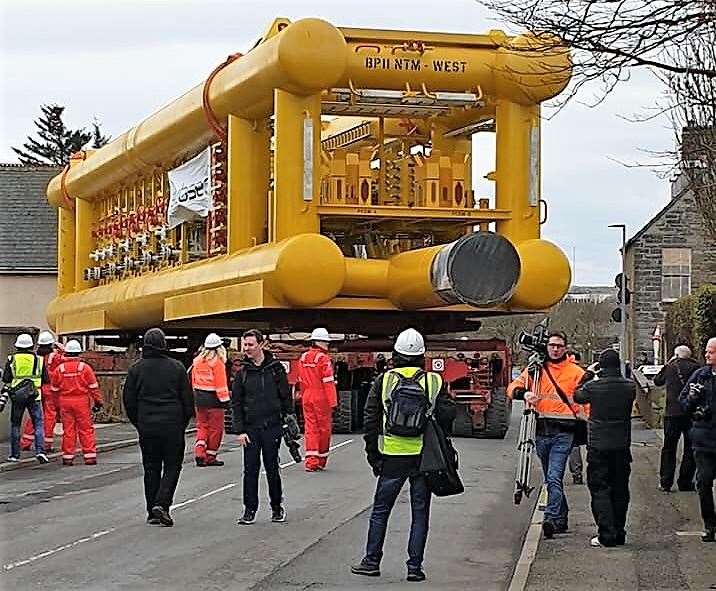 The huge towhead is manoeuvred through the streets of Wick. Pic: Derek Bremner