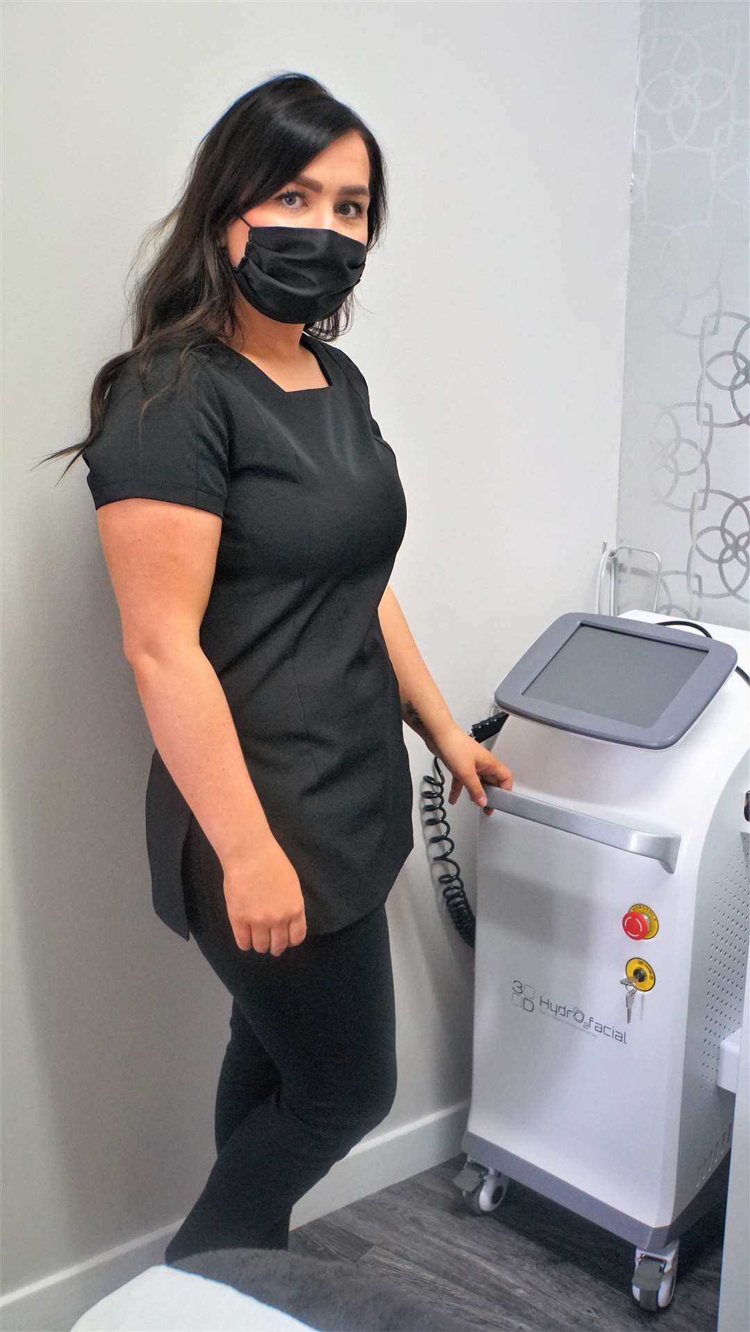 Terren with the new 3D-HydrO2 Facial machine she purchased during lockdown.