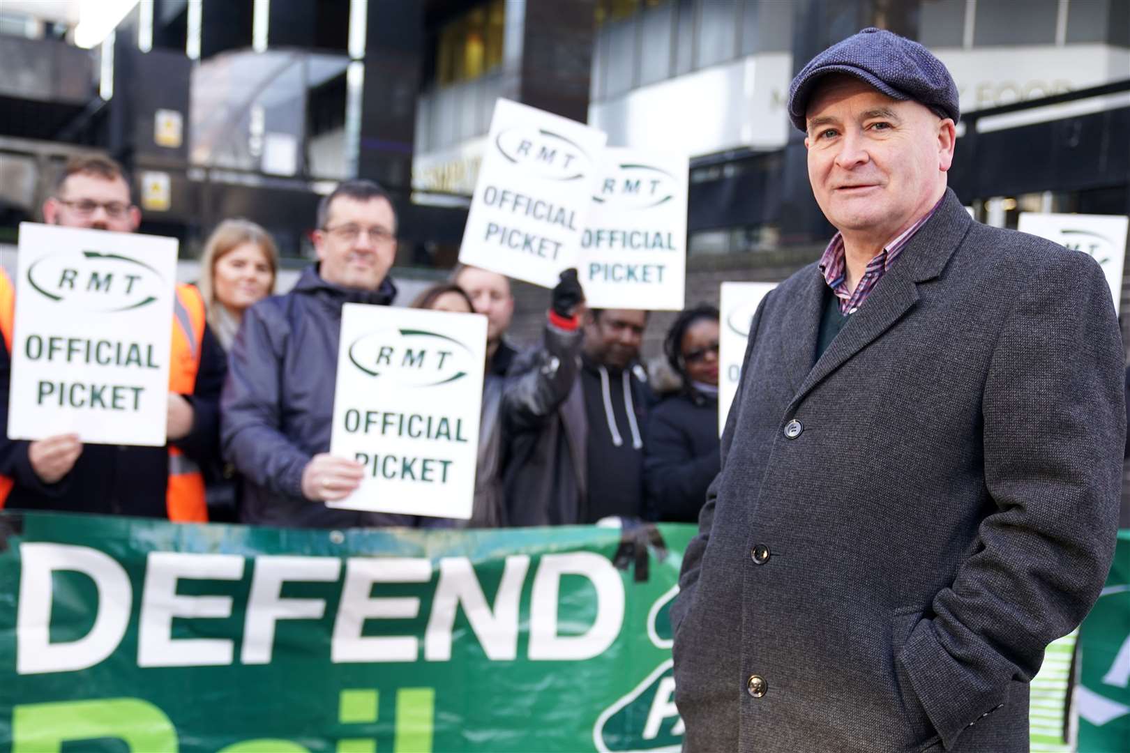 Mick Lynch, general secretary of the RMT union, joins union members on the picket line outside Euston station in London during a rail strike in a long-running dispute (Kirsty O’Connor/PA)