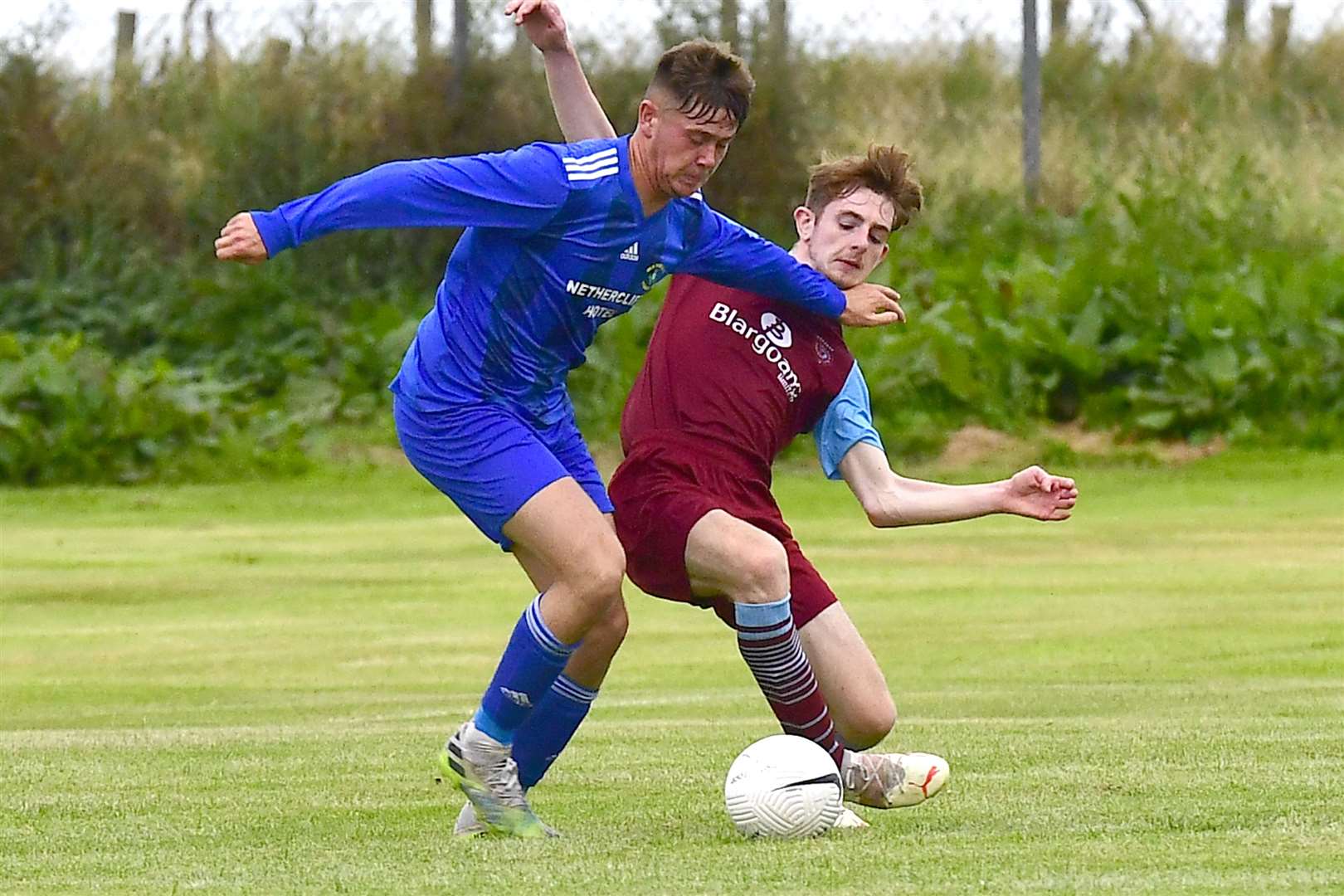 Wick Thistle's Kieron Davies and Roddy Innes of Pentland United. Picture: Mel Roger