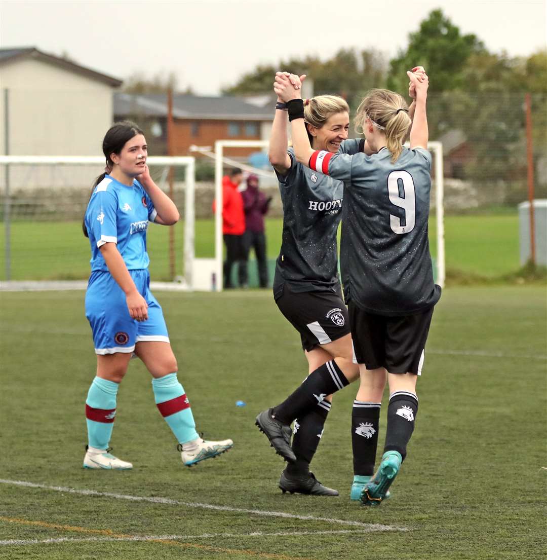 Rachel Campbell (left) is congratulated by Carly Erridge after rounding off the scoring in stoppage time. Picture: James Gunn