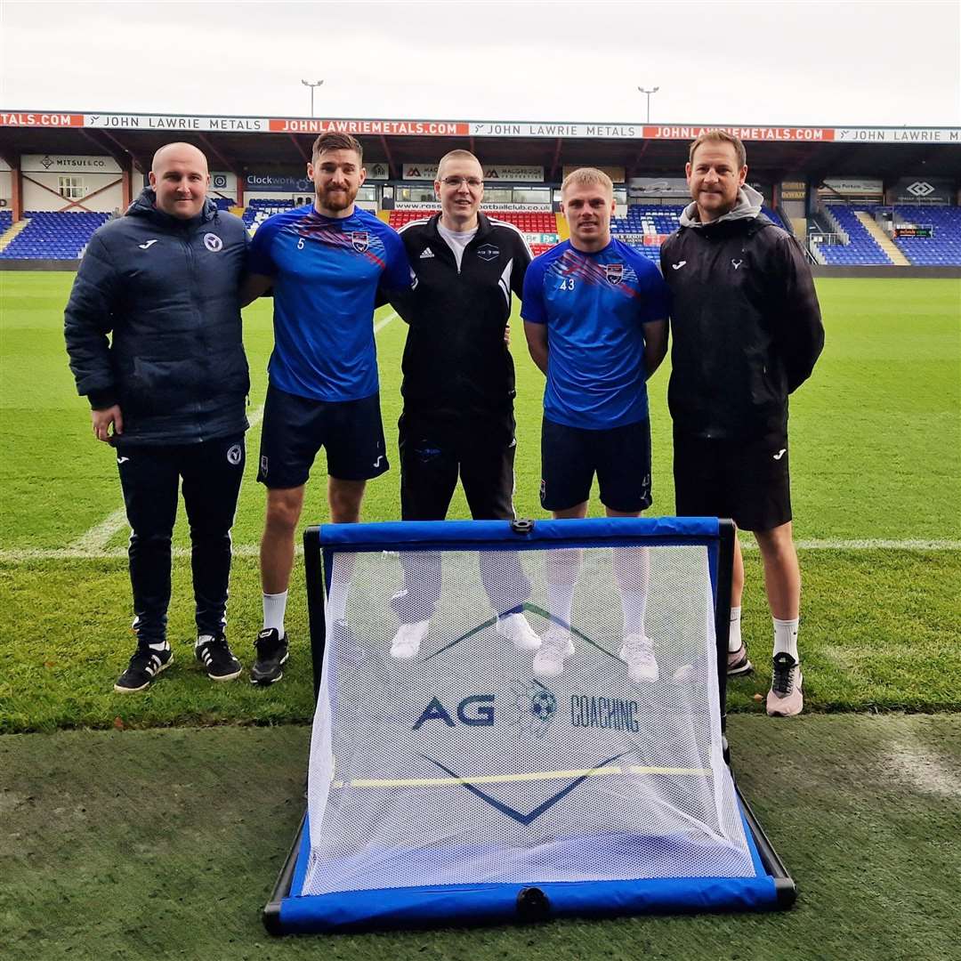Alyn Gunn of AG Coaching (centre) at the Global Energy Stadium in Dingwall with (from left) Ryan Farquhar, head of the Ross County Foundation, club captain Jack Baldwin, left-back Josh Reid and Gary Warren, head of the Ross County academy.