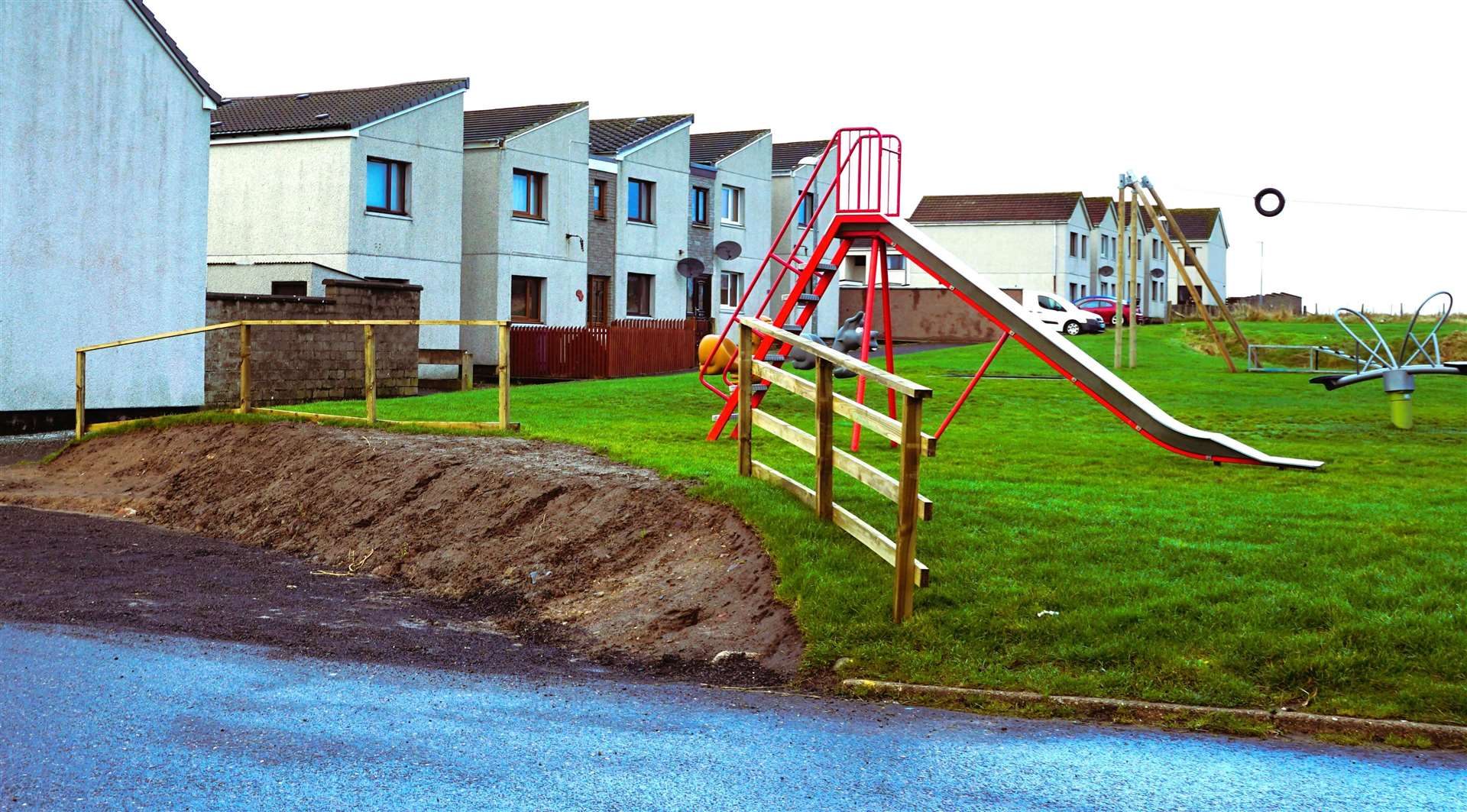Cllr McEwan says that when the fence is finished it will be sitting too close to the children's slide. Picture: DGS