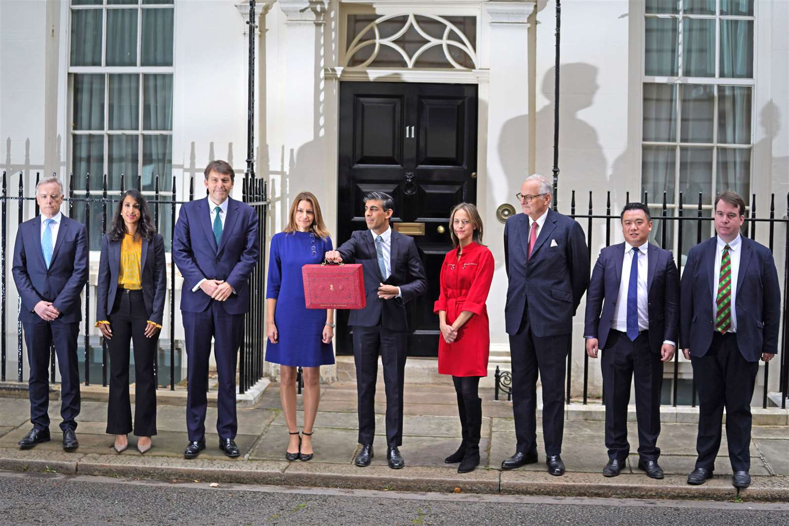 Chancellor Rishi Sunak with his ministerial team and parliamentary private secretaries leaving 11 Downing Street before delivering his Budget to the House of Commons (Jacob King/PA)