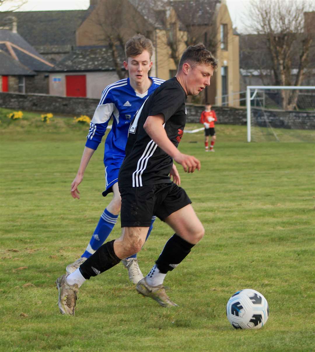 Alfie Mackay on the ball for Lybster against Keiss. Picture: Alan Hendry