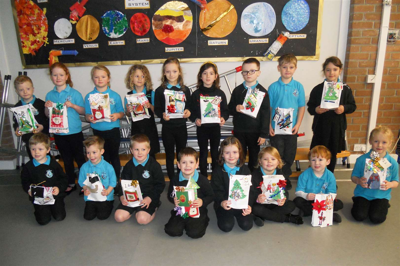 The P1-3 class at Melvich who made decorative bags from recyclable materials.