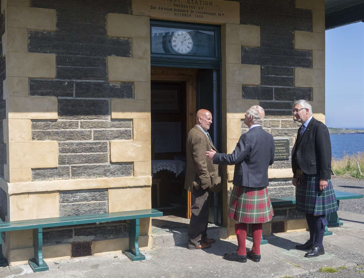 The Duke of Rothesay meets Peter Sutherland at the Pilot House, which was turned into a small tearoom by Peter's late father, local historian Iain Sutherland. Looking on is Vice-Lieutenant Willie Watt. Picture: Robert MacDonald / Northern Studios