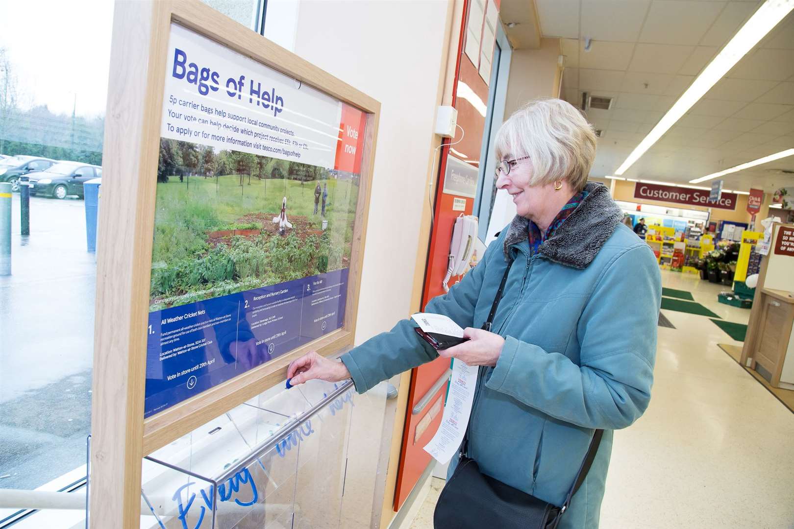 Tesco customers cast votes in store to award Bags of Help funding to local groups. Picture: Kevin Lines