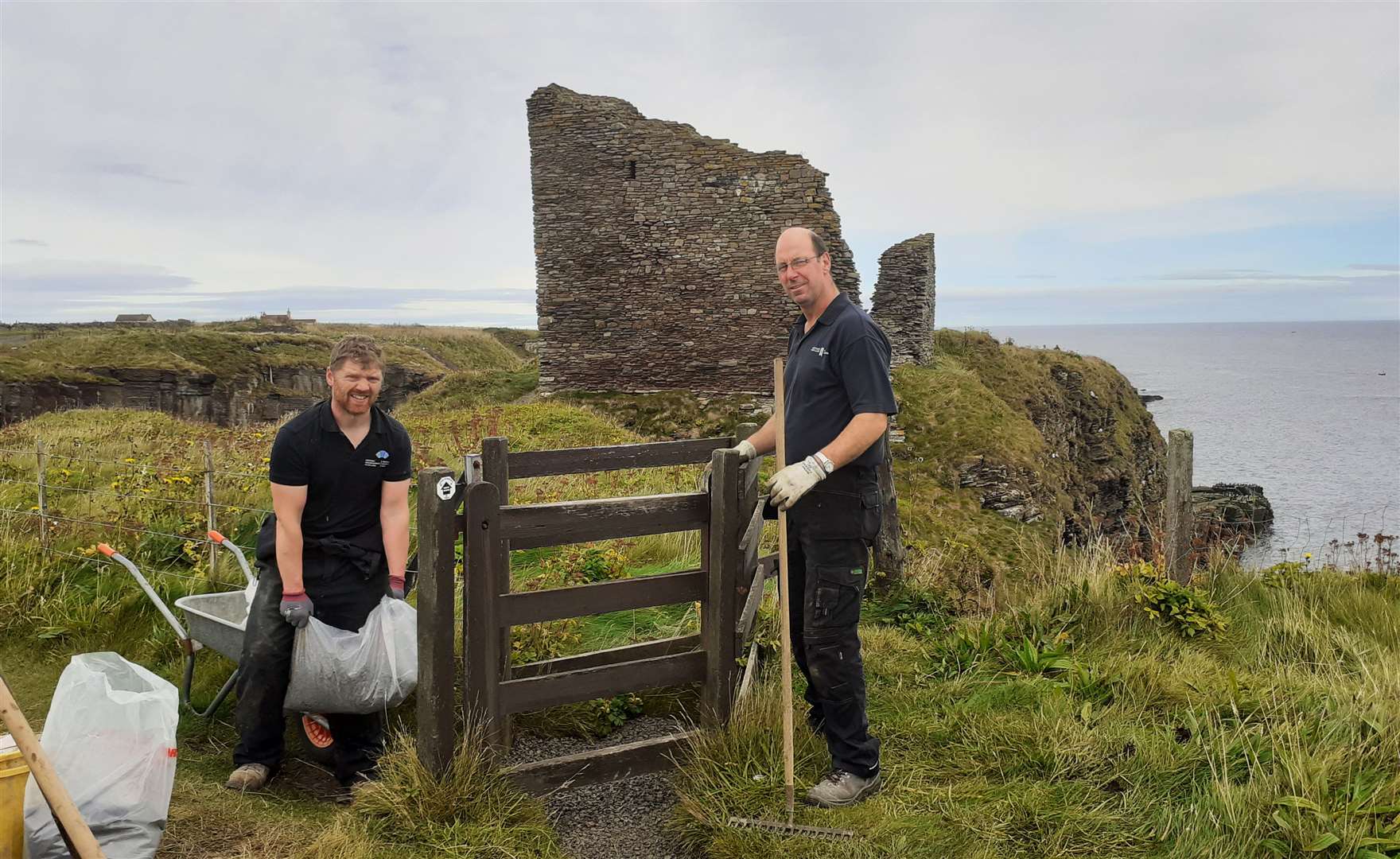 Orkney-based Historic Environment Scotland maintenance workers Robbie Macvie (left) and Ian Linklater near the Castle of Old Wick on Monday. Picture: Alan Hendry