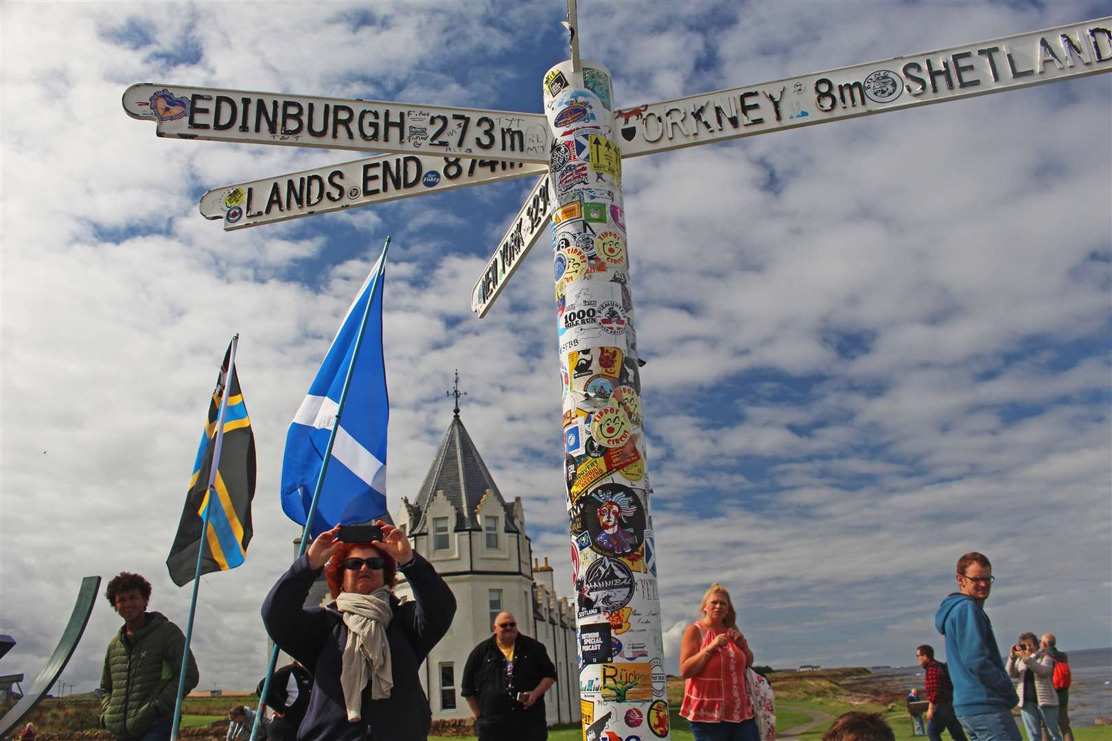 Tourists at the John O'Groats signpost the summer before last. Picture: Alan Hendry