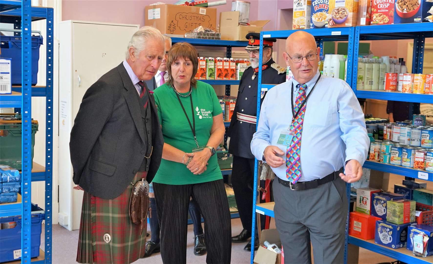 King Charles III, when he was heir apparent to the throne, in conversation with Pat and Grant Ramsay during his visit to Caithness Foodbank in August. Picture: DGS