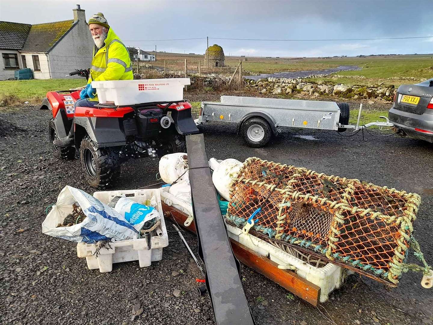 Allan Sinclair used a quad bike and sledge to remove items from the coast at Freswick.