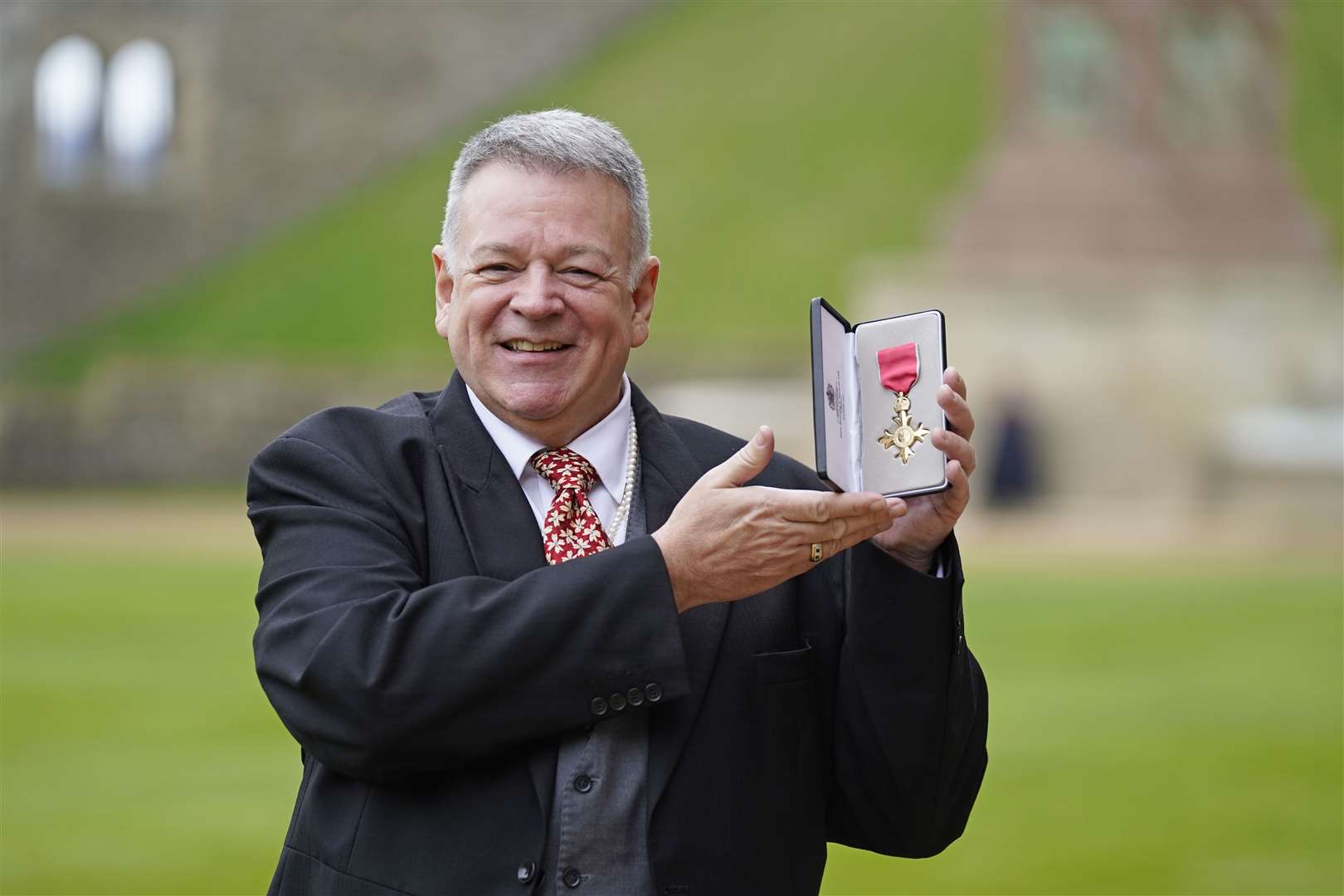 Oboist and conductor Professor Nicholas Daniel after receiving his OBE from the Princess Royal at Windsor Castle (Andrew Matthews/PA).