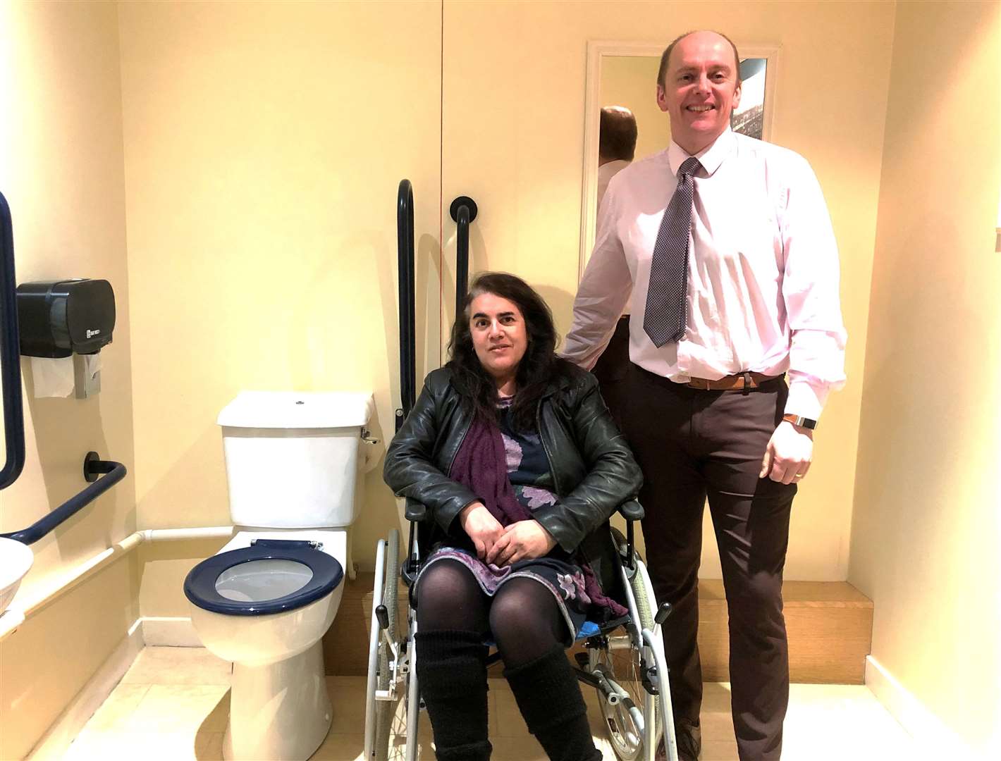 Louise Smith with hotel owner Andrew Mackay at the Norseman's disabled toilet in Wick. Louise campaigned for years to see local provision for the disabled improved throughout the county.