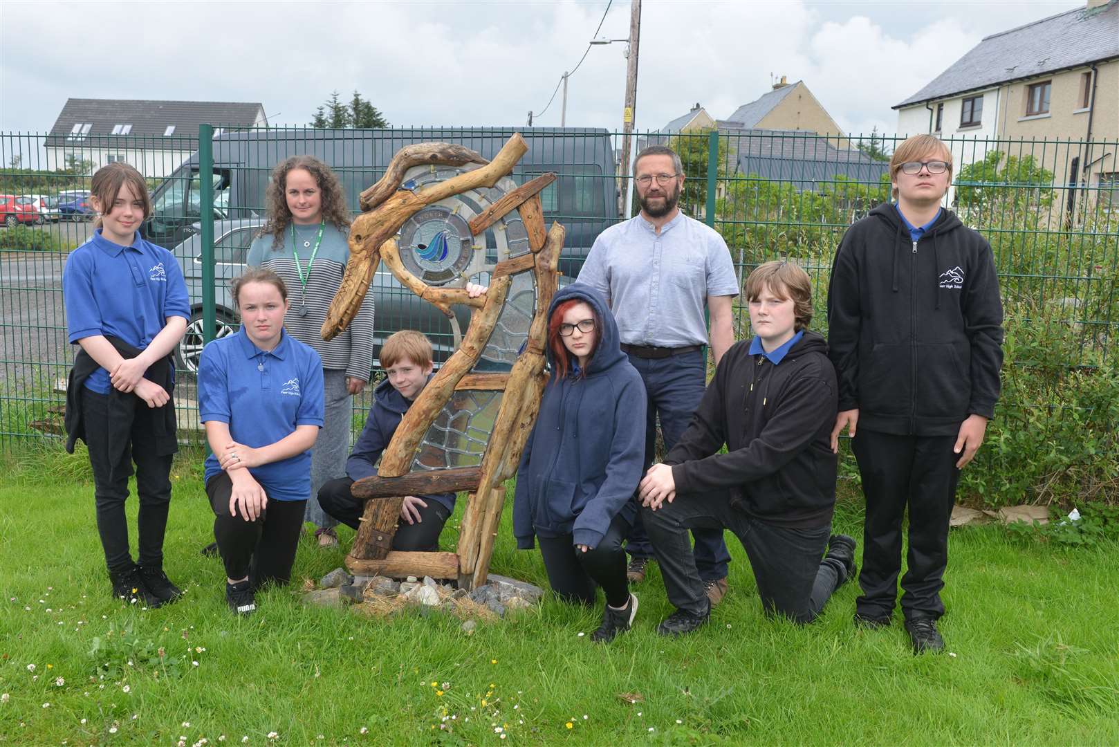 North Coast Campus head teacher Katherine Wood and glass artist Michael Bullen stand beside one of the pieces of artwork with S2 pupils at Farr High School, from left Rehanna Coles, Christina Gilmour, Iain Magee, Lucy Herd, Sam Heddle and Jayden Mackay.