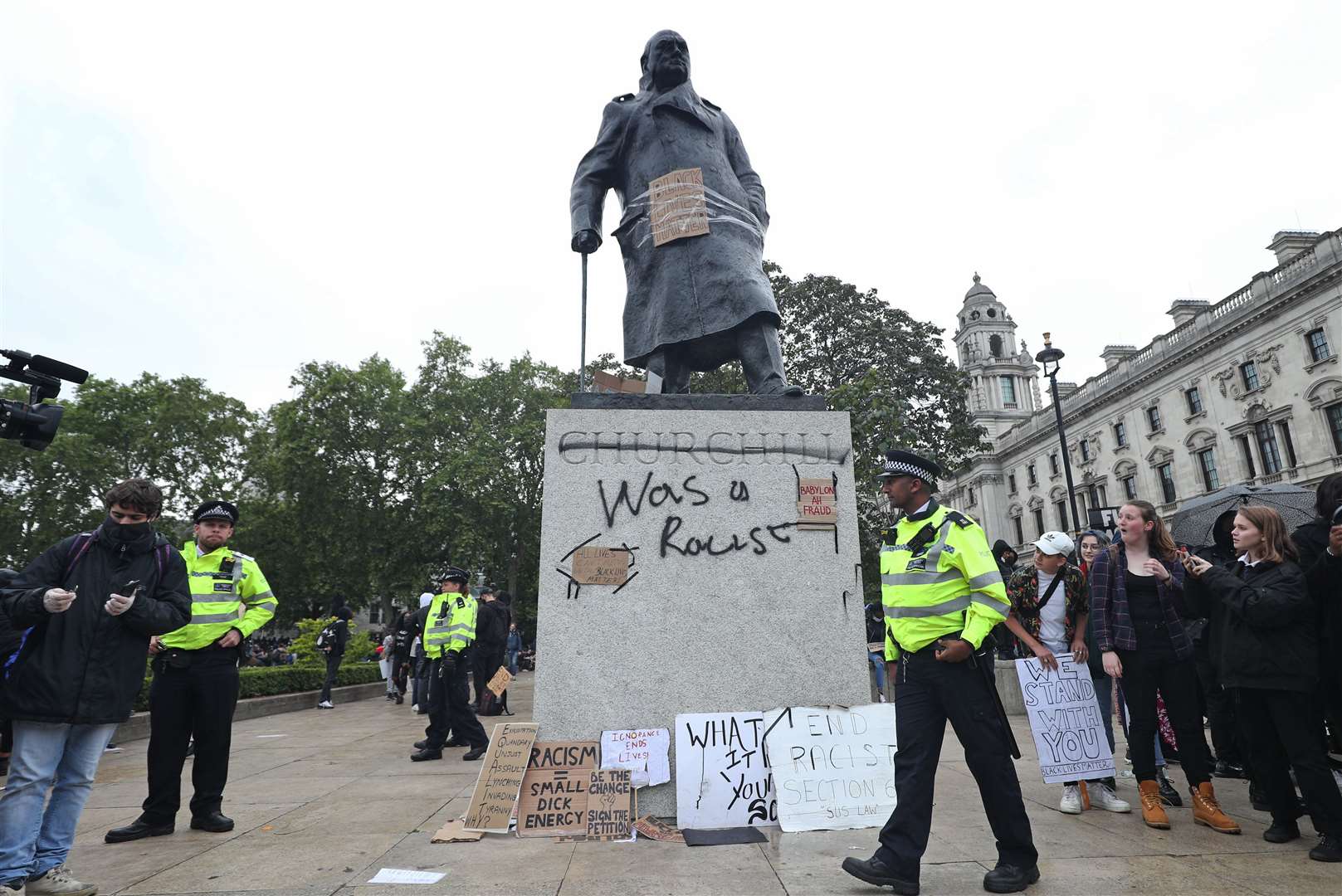 Graffiti on the statue of Sir Winston Churchill in London (Yui Mok/PA)