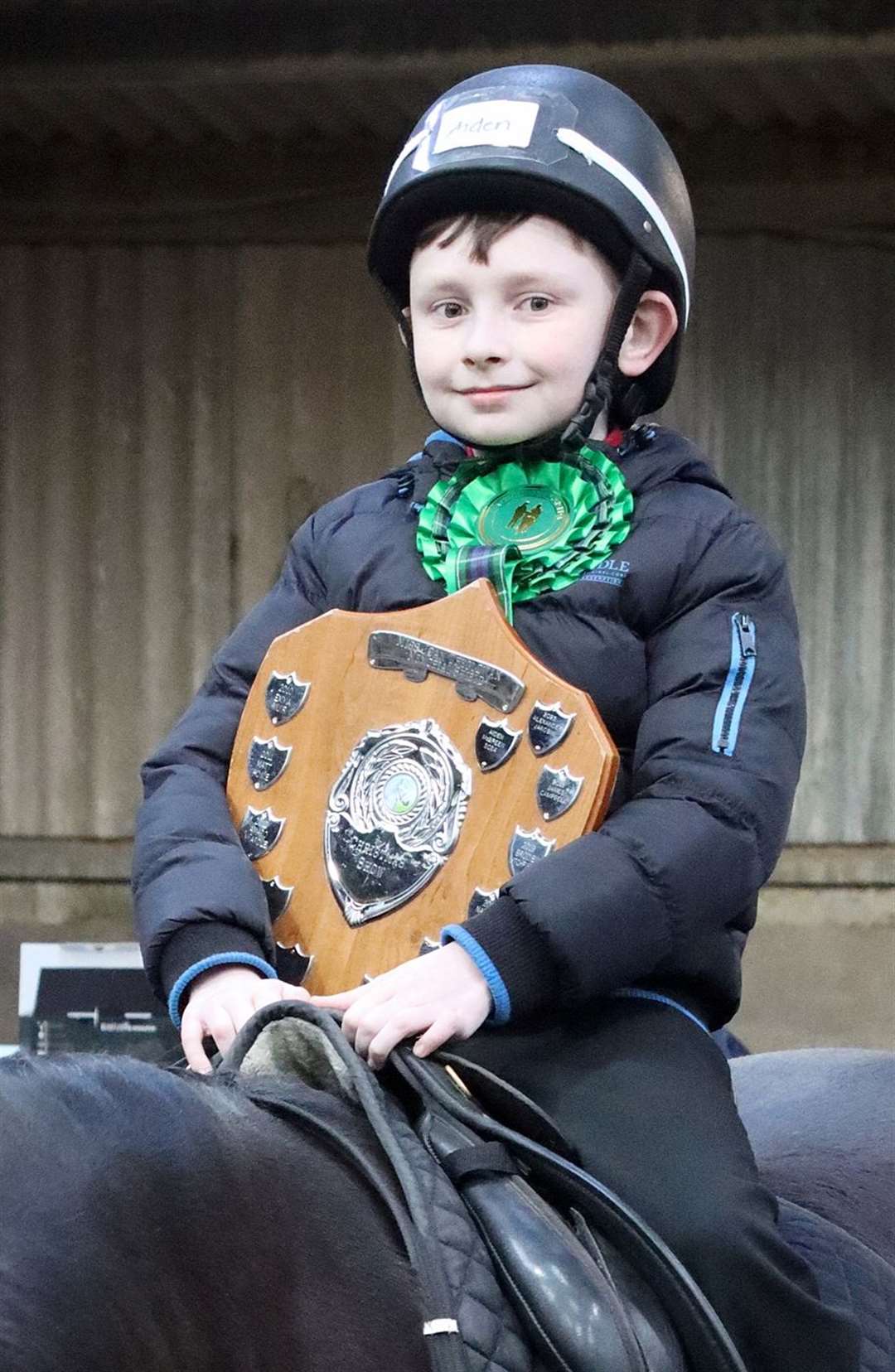 Aiden McBreen showing off his trophy. Picture: Neil Buchan