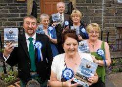 Author Marigold Stewart (front) with her book, Kenny’s Bairns, that will be launched at the Caithness County Show. Also in the photograph are five of her siblings (from left): Richard, Nancy, Kenny, June and Ishbel. Marigold’s sister, Betty, lives in the US and another sister, Jesmil, is deceased. Photo: Robert MacDonald.