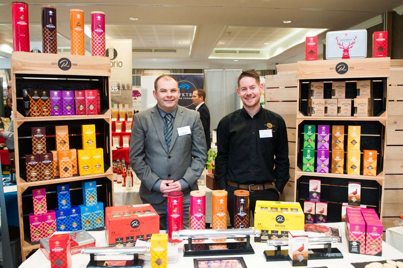 MD of Reid’s Bakery Gary Reid (left) with staff.