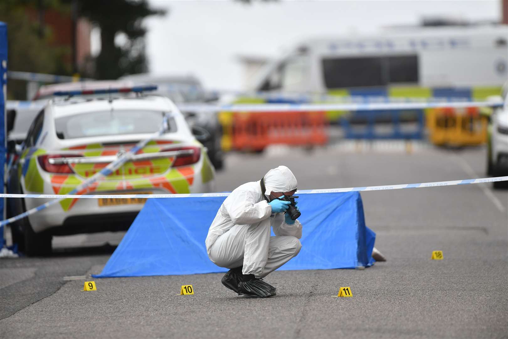 A police forensics officer in Irving Street in Birmingham (Jacob King/PA)