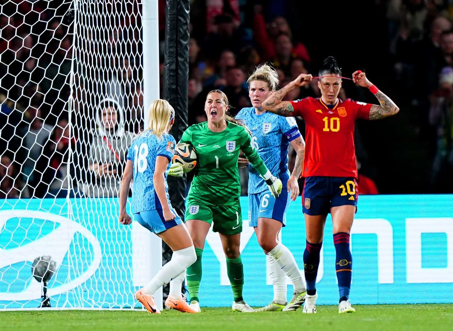 England goalkeeper Mary Earps celebrates after saving a penalty from Spain’s Jennifer Hermoso(Zac Goodwin/PA)