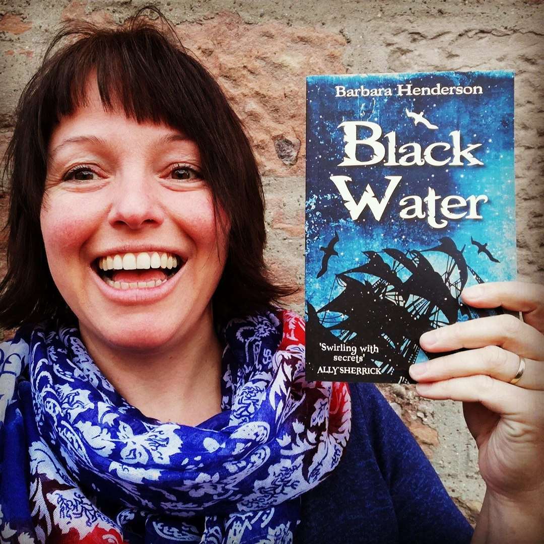 Barbara Henderson with her adventure story for youngsters, Black Water.