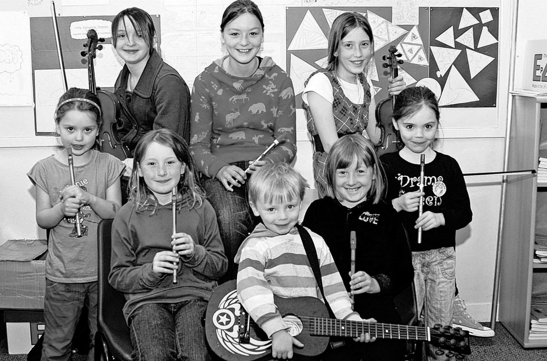 Junior folk group members getting ready for the Caithness and Sutherland Provincial Mod which was taking place in Bettyhill in June 2009.