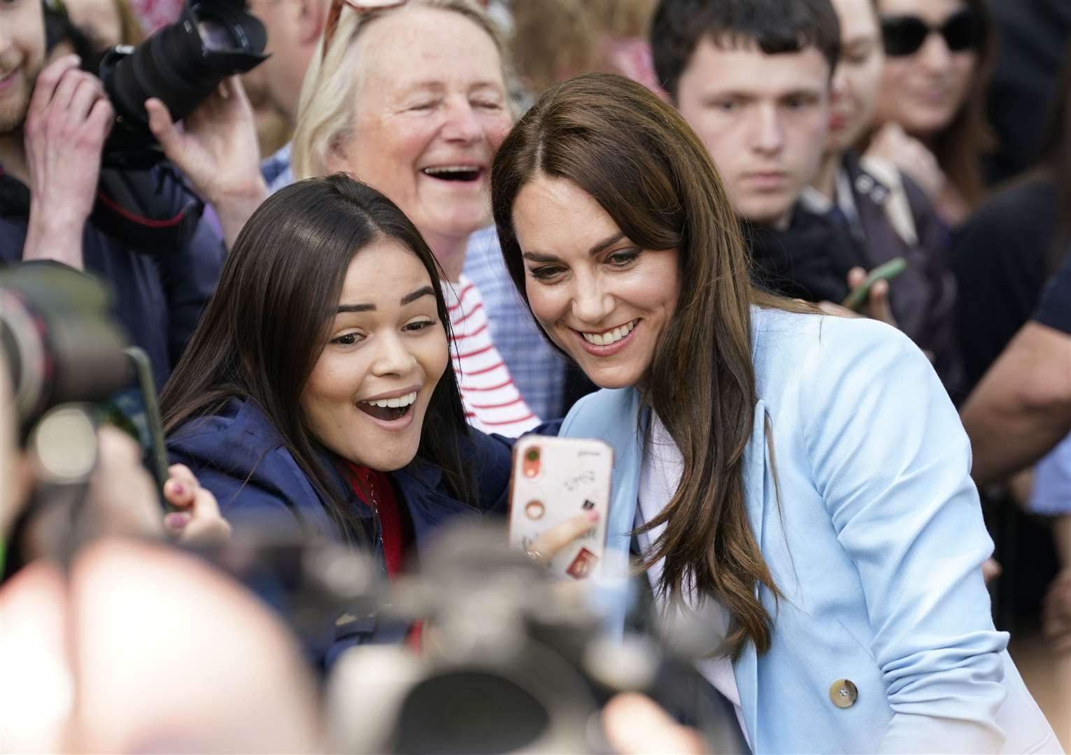 Kate poses for a selfie during their Windsor walkabout (Andrew Matthews/PA)