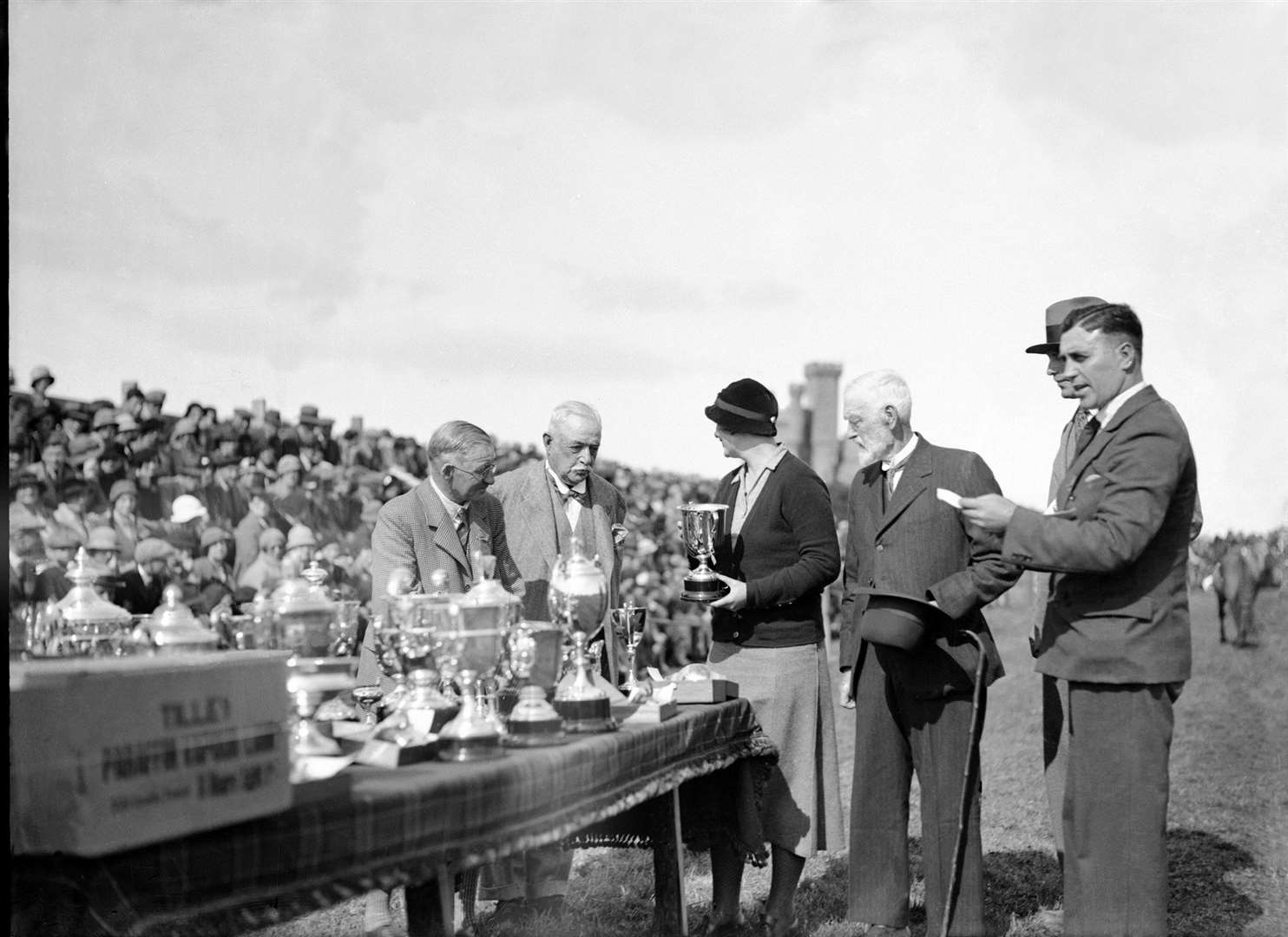 Prize presentation at the centenary show with the Duke of Portland (second from left), Marigold Sinclair, Sir Archibald’s wife, and Charles Davidson, Cogle Farm, Watten, the oldest member of the society who attended 72 shows without a break. Picture courtesy of the Wick Society, Johnston Collection