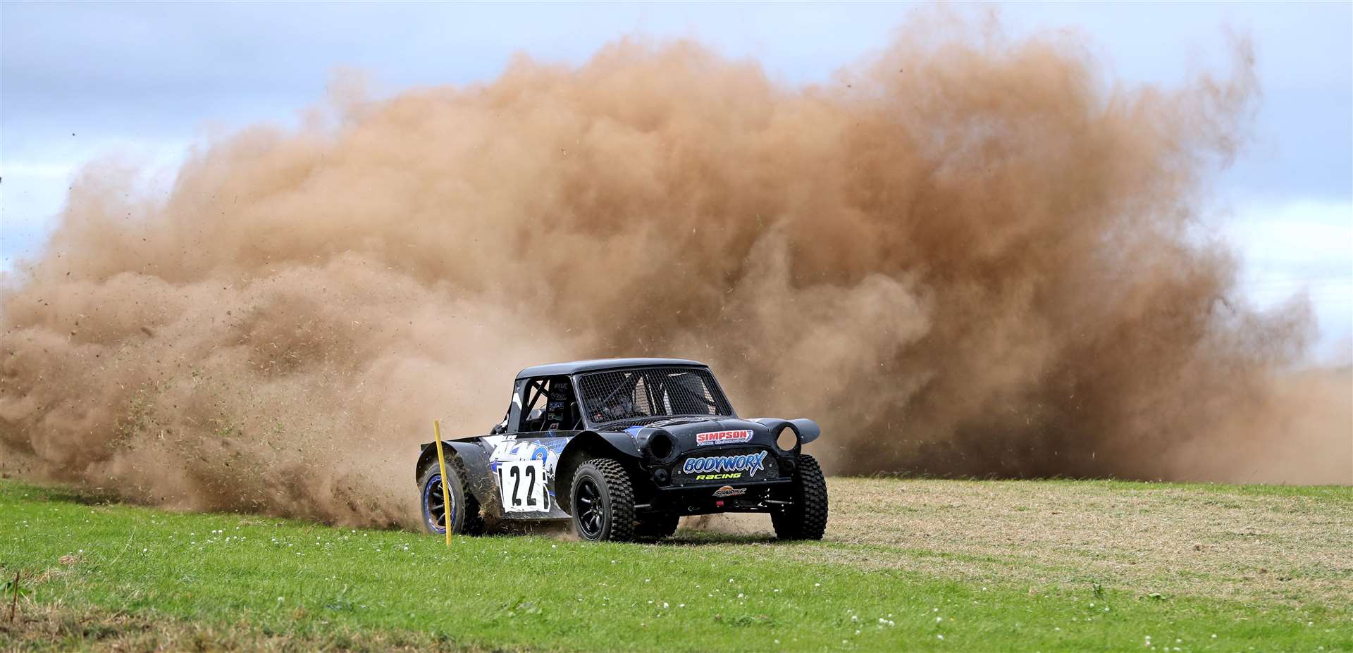 Gary Elder exits from the final corner on Saturday in his twin-engined Mini special. Picture: James Gunn