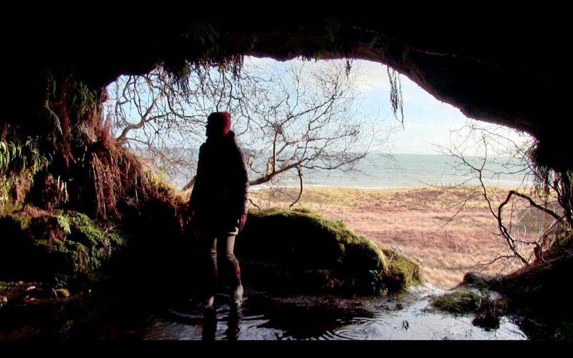 Jacquie Aitken inside the cave.