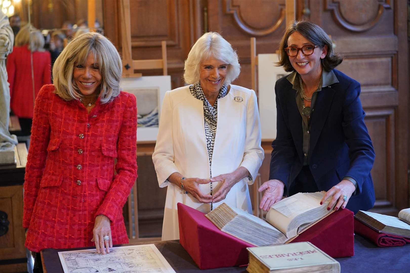Brigitte Macron and Queen Camilla with president of the French National Library Laurence Engel during a visit to the Bibliotheque Nationale de France in Paris (Yui Mok/PA)