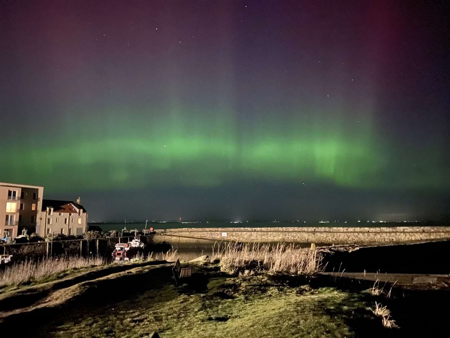 The northern lights over St Andrews in Scotland (Payton Cooney/St Leonard’s School/PA)