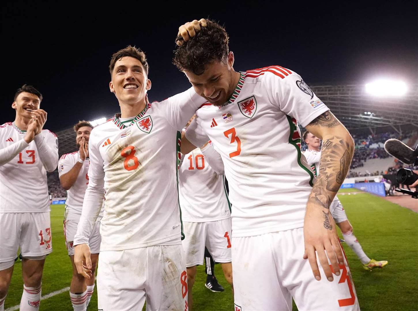 Harry Wilson and Neco Williams (right) celebrate after a Uefa Euro 2024 Group D qualifying match in Split (PA)