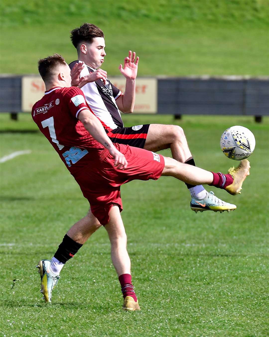 Gary Pullen of Wick Academy blocks a clearance by Keith's Gavin Elphinstone. Picture: Mel Roger