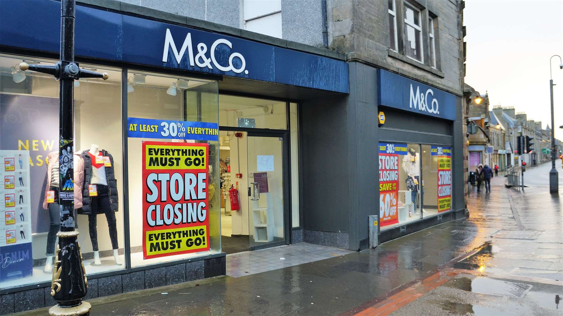 Closing-down sale signs at the Thurso M&Co branch at the weekend. Picture: DGS